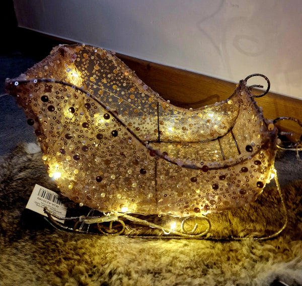 Al interior - Sleigh with LED lighting - Sequins - Gold glitter - Rattan